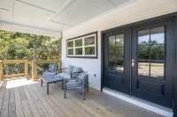 New cottage blocks from the beach; pets OK! Firepit!  Grill! EV Charger! 65” TV