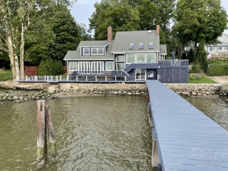 River front with large decks and dock over the Hudson