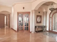 AUTHENTIC SANTA FE TUSCAN-STYLE VILLA WITH PANORAMIC VIEWS.