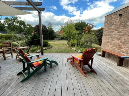 Modern holiday apartment with a large terrace and garden near Hamburg