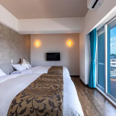 Mr.KINJO Manza Beachfront Hotels near Manza Chapel