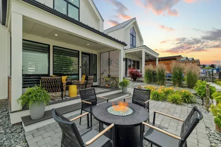 Outdoor Heater & Covered Patio, Paddle Boards, Fire Table, Bikes, Outdoor Games