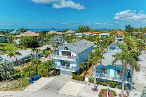View of Beach from the deck, Walk to all , free WIFI.