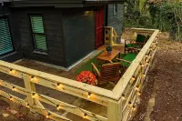 Cozy 2 BR bungalow, moody design, walk to square