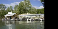 Great price on NEW listing! Enjoy farmhouse charm in a lake view walkout condo
