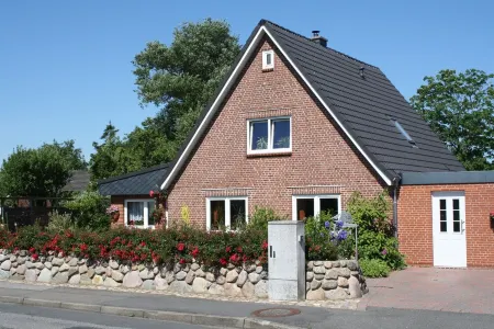 near the dyke (30m) and green beach, sea water swimming pool