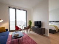 Premier Suites Amsterdam Hoteles cerca de Museo Van Loon
