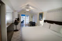 Cozy Poolside Cottage with Tropical Gardens - Charming Island Retreat