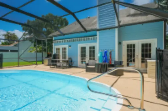 Tranquil Escape with Screened Pool and BBQ - Charming Retreat