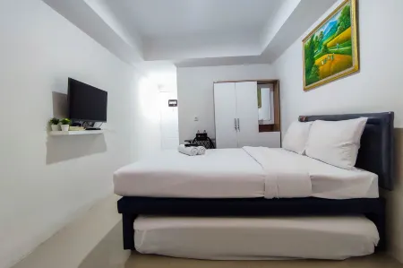 Comfort and Well Design Studio at Paltrow City Apartment