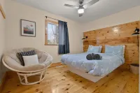 Rarely offered 2 waterfront cottages with 2 hot tubs side by side!