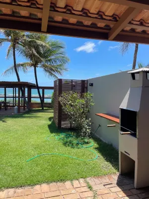 Beachfront house, right on the sand, in the best location on Barra de São Miguel beach