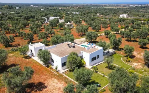 Spacious pool villa with sweeping sea views in extensive olive grove