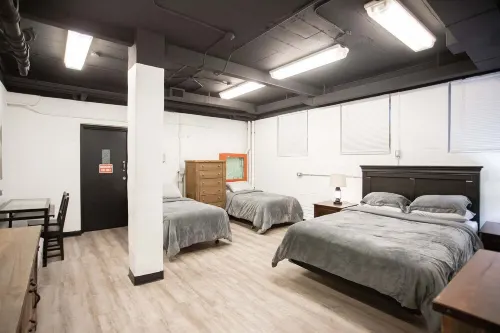 Charming Prohibition-Era Speakeasy Lounge with Bedroom and Commercial Kitchen
