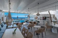 Flaskos Suites - servizio colazione