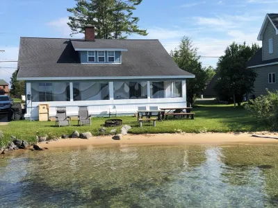 Torch Lake Oasis: Serene Views & Waterfront Bliss Await!