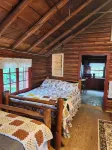 Rustic Log Cabin #8 on Crow Lake at Bull Moose Lodge. Family and pet friendly