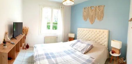 Appartement Proche de L'aéroport de Nantes Отели в г. Сент-Эньян-Гранльё