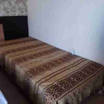 Hotel apartment with a pool right across the street from the beach Rooms