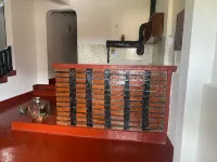 Stylish three bedroom African-themed holiday home! Private baths and kitchen.