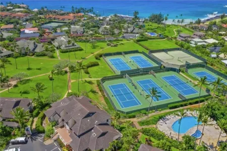 Boutique Condo with Contemporary Art: Steps from Scenic Poipu Beach Trail.