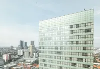Lovely and Vibrant 2BR Space at Praxis Apartment by Travelio - Condos