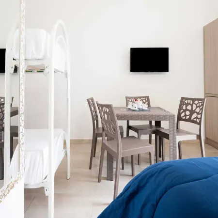 Monolocale Vela – Nuovo con Wi-Fi, Clima e Giardino a Torre Lapillo