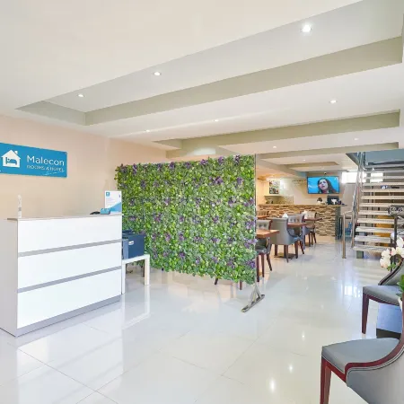 Malecon Premium Rooms & Hotel