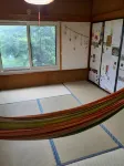 It is a Farmhouse Inn Located in a Satoyama Surrou Hotel di Hiranai