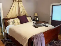Plum Crooked Poet’s Cottage ~  Once Upon A Time ~ Downtown Marshall Hotels in Marshall