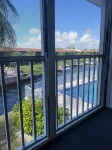 Margaritaville Themed Condo, King Bed Suite, Waterfront + Pool, Near Downtown