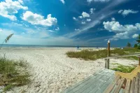 Premier, newly renovated luxury beachfront (top-floor) condo on the Gulf coast.