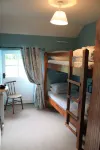 2 bedroom cottage, with far reaching views of the garden and open countryside.