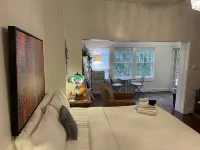 CLOSE TO DOWNTOWN- The Peacock Retreat- Dogs Stay Free