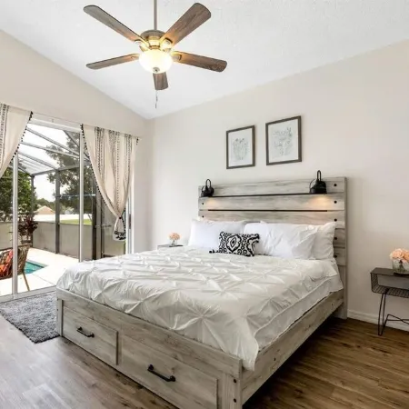 Lovely home near Disney with a Heated pool and game room in a resort community.