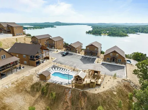 NEW! LAZY RIVER+Pools+Hot Tub+Game Rm+Theater Rm+Arcade, LAKE Views, Sleeps 22