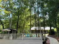 Lake Martin lakehouse. Screened porch. Dock.  firepit & views. 30 min to Auburn