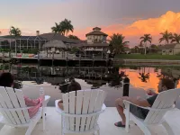 Stunning SW home w/perfect indoor-outdoor living! Infinity pool/spa/great canal.