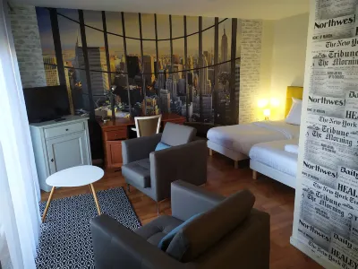 Résidence Carouge Appart Hôtel - Appartements Hôtels à proximité de : Auchan Supermarché Bretigny
