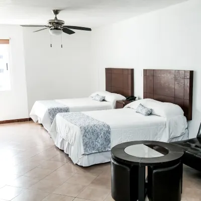 Suites Dioh Hotels near Obispado Museum