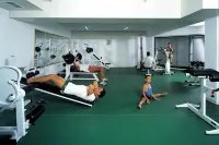 Helios Bay Hotel and Suites - gimnasio