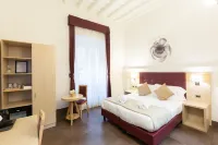 SuitInn19 Отели в г. Трастевере