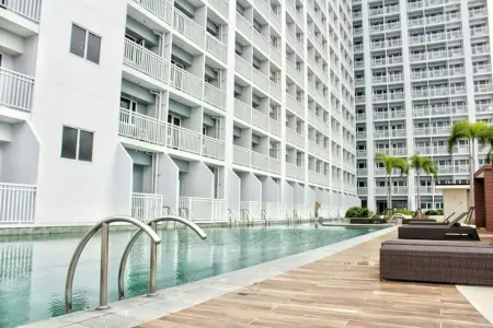 Condo Unit with Balcony in Manila Отели рядом с достопримечательностью «SM Moa, Dasmarinas, Imus,Paliparan Transport Association, Inc.»