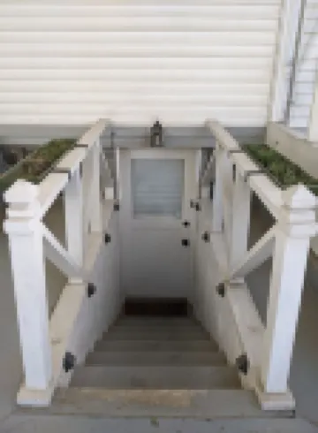Lovely basement apartment with covered outdoor patio.