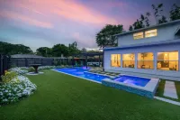 Refreshing Pool and Fire Pit Experience - Charming Coastal Escape