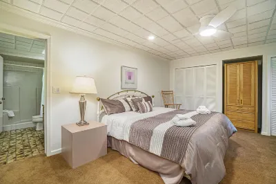 Stylish retreat with a wood fireplace, full kitchen, sunroom, & W/D access