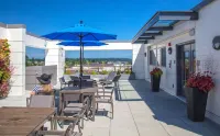 Rooftop Deck and Fitness Center - Luxurious Sophisticated Retreat