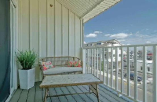 Bright and Airy Condo.  One block to the Beach.  Great location.