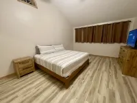 Gas Fireplace and Outdoor Landing with Seating - Charming Oasis Hotels in La Porte