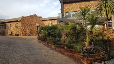 Tsessebe Guesthouse Отели рядом с достопримечательностью «Free State National Botanical Garden»